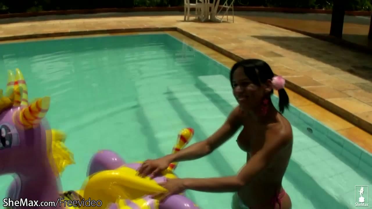 Cheerful teen 18+ shemale shows off sexy ass in thongs poolside_main_thumbnail