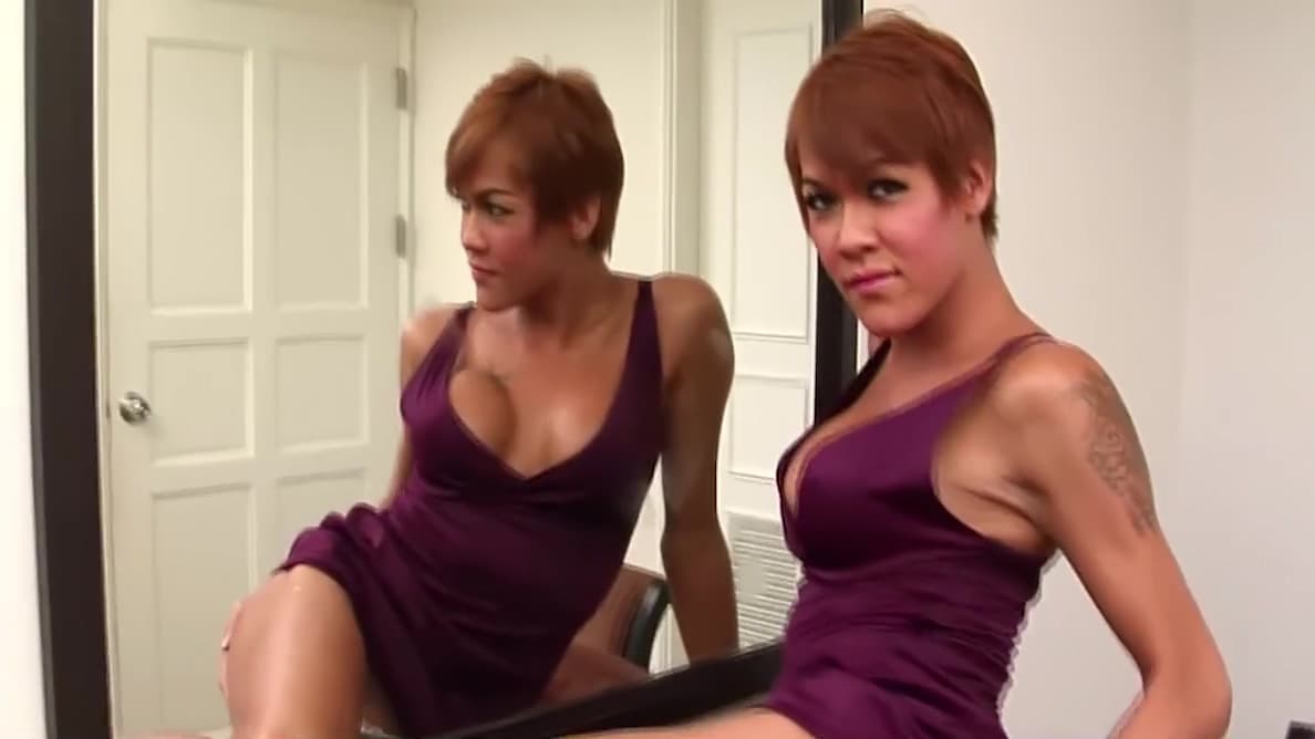 Busty Ladyboy Strips Her Red Dress And Plays With Her Shaved Dick_main_thumbnail